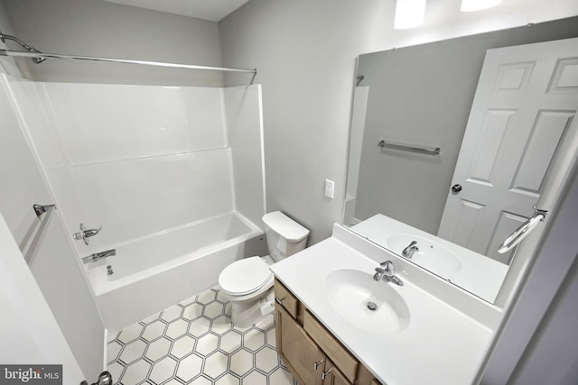 full bathroom featuring vanity, shower / bath combination, and toilet