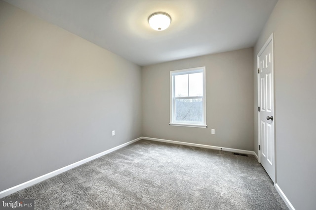 empty room featuring carpet