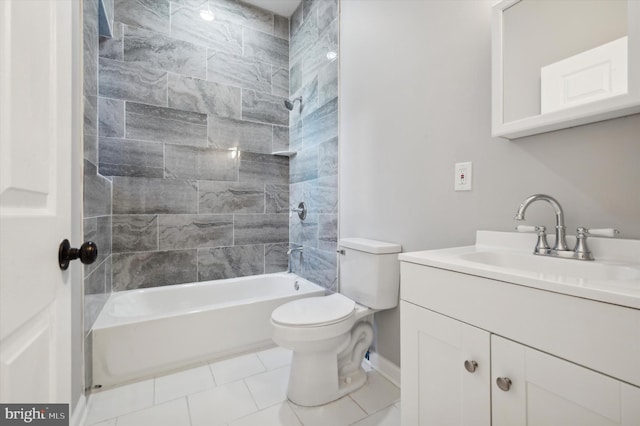 full bathroom with tile patterned flooring, tiled shower / bath combo, toilet, and vanity