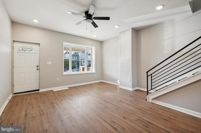 entrance foyer with hardwood / wood-style flooring and ceiling fan