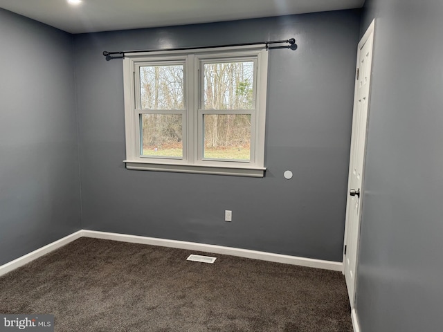 view of carpeted spare room