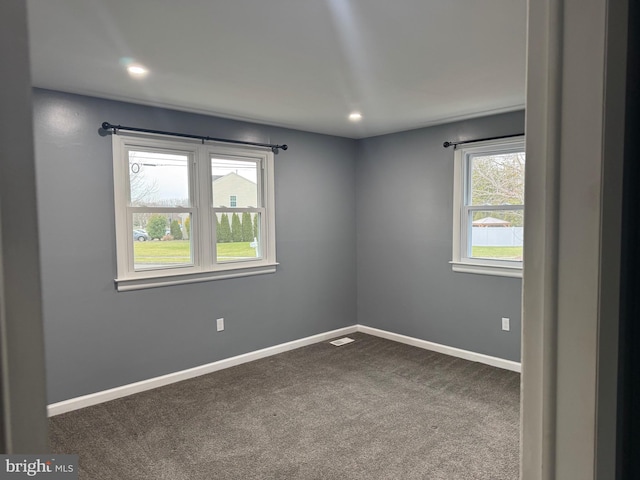 view of carpeted spare room