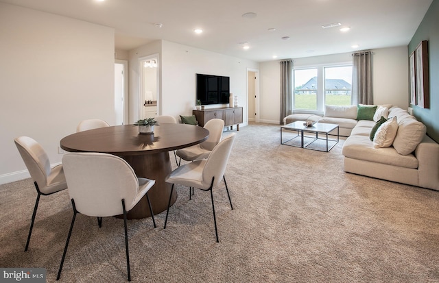 view of carpeted dining room