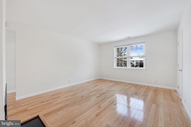 empty room featuring light hardwood / wood-style floors