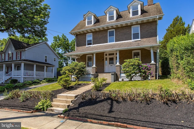 view of front of home featuring covered porch