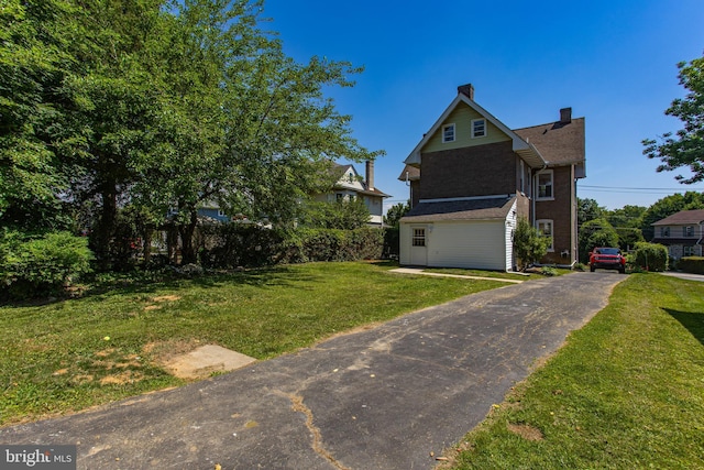 view of property exterior featuring a yard