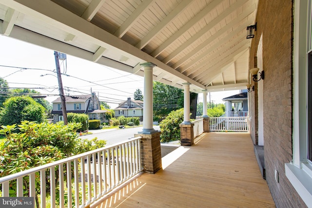 wooden terrace with covered porch