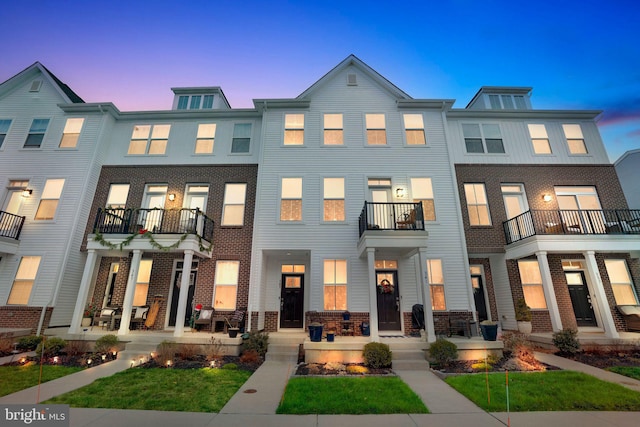 view of property with a balcony