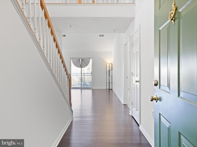 entrance foyer featuring dark wood-type flooring