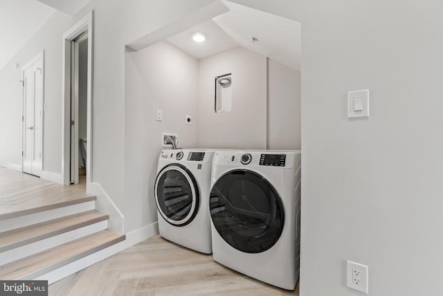 washroom with washer and clothes dryer