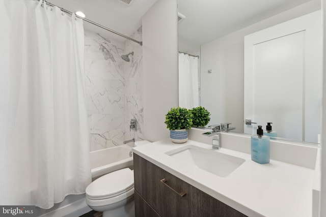 full bathroom featuring vanity, toilet, and shower / bath combo with shower curtain