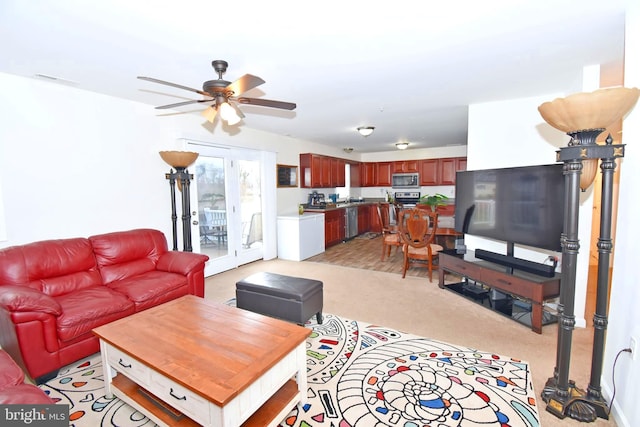 living room featuring ceiling fan