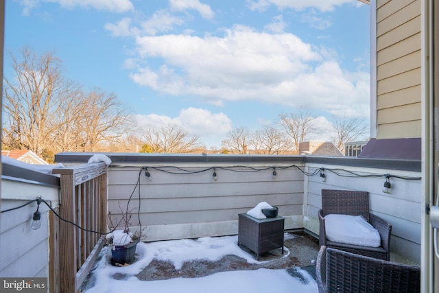 view of snow covered patio