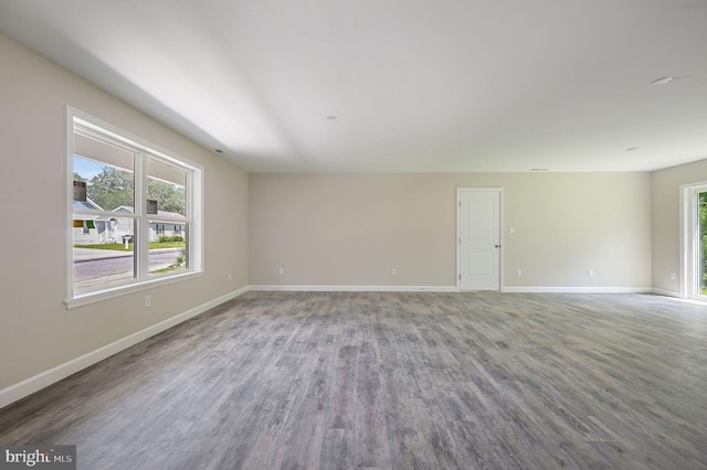 613 W 8th St, Laurel, DE 19956 - spare room featuring baseboards and wood finished floors