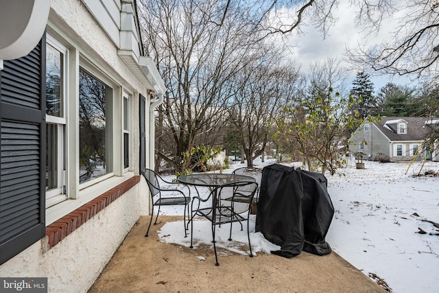 view of yard covered in snow