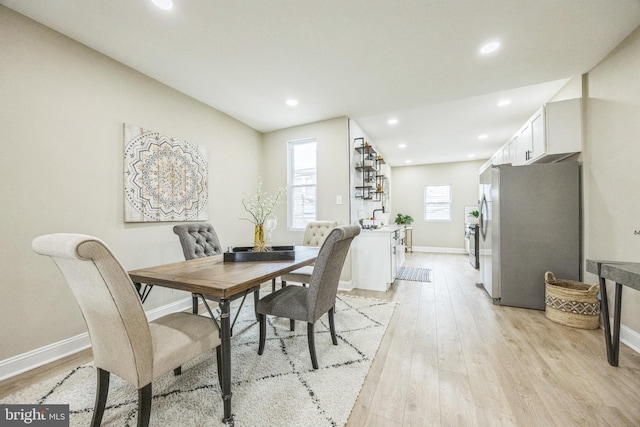 dining room featuring light hardwood / wood-style floors