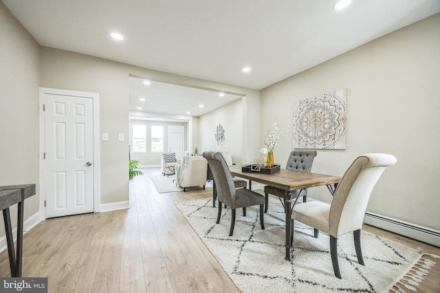 dining room with light wood-type flooring