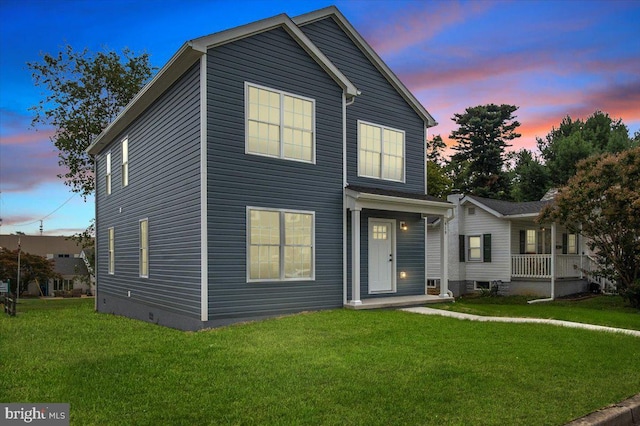 view of front of house with a lawn