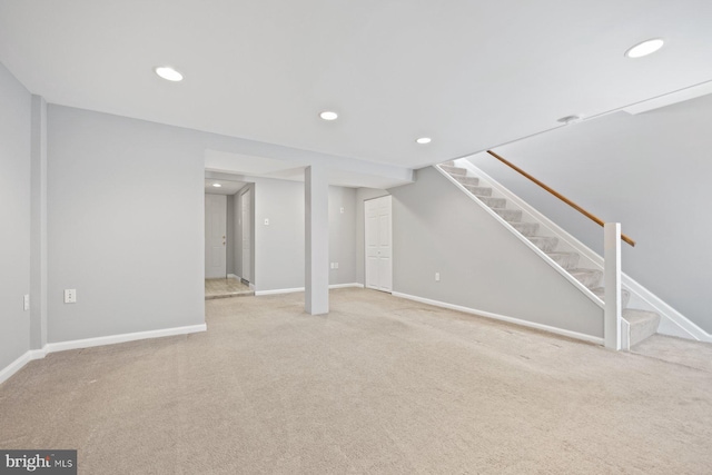 basement with carpet flooring