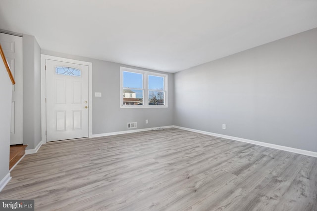 foyer featuring light wood-type flooring