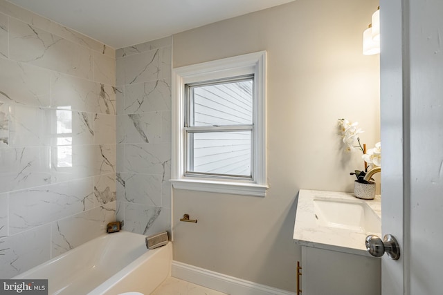 bathroom with plenty of natural light, vanity, and tiled shower / bath combo