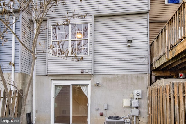 view of property exterior with central AC unit