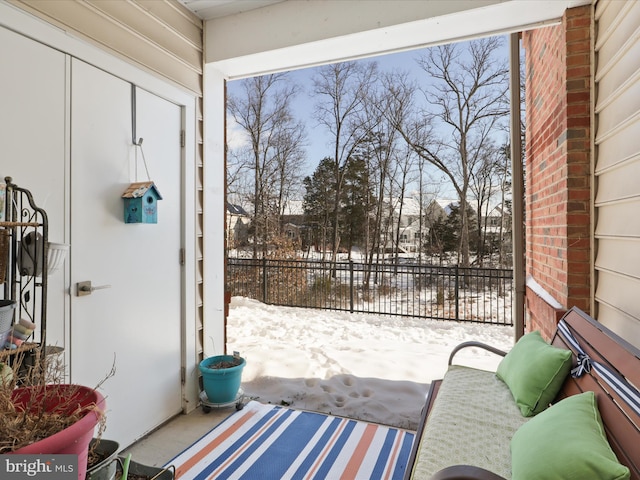 view of snow covered patio