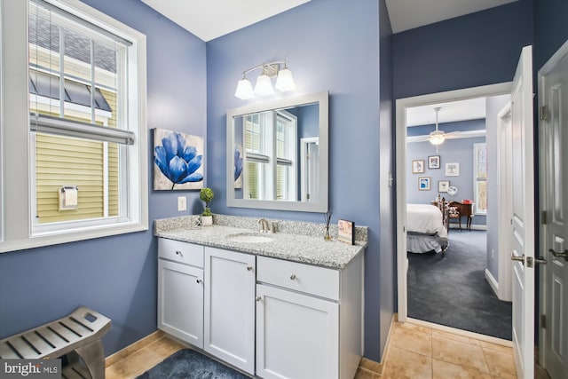 bathroom with tile patterned floors and vanity