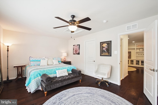 bedroom featuring ceiling fan and dark hardwood / wood-style floors