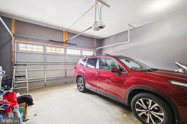 garage featuring a garage door opener