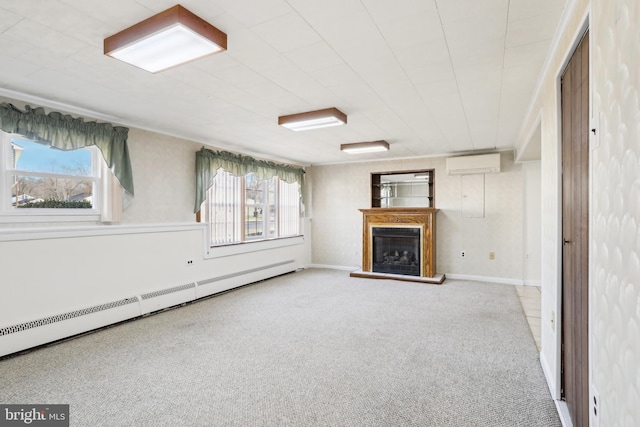 unfurnished living room with a wall mounted air conditioner, baseboard heating, and light carpet