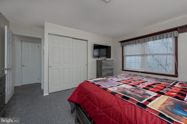 carpeted bedroom featuring a closet