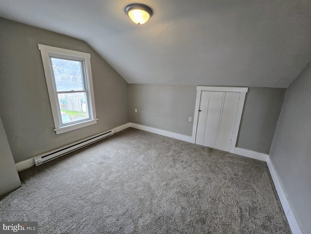 bonus room with baseboard heating, carpet flooring, and lofted ceiling