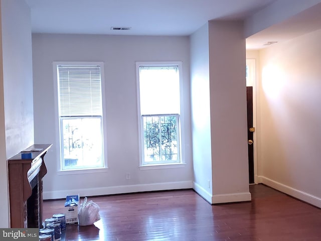 living room featuring dark hardwood / wood-style floors