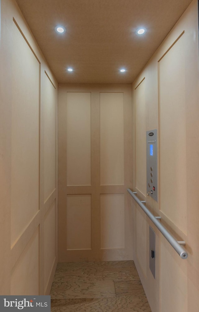 645 Angelfish Way, Woodbridge, VA 22191 - elevator featuring recessed lighting and a decorative wall
