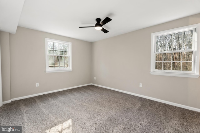 carpeted empty room with ceiling fan