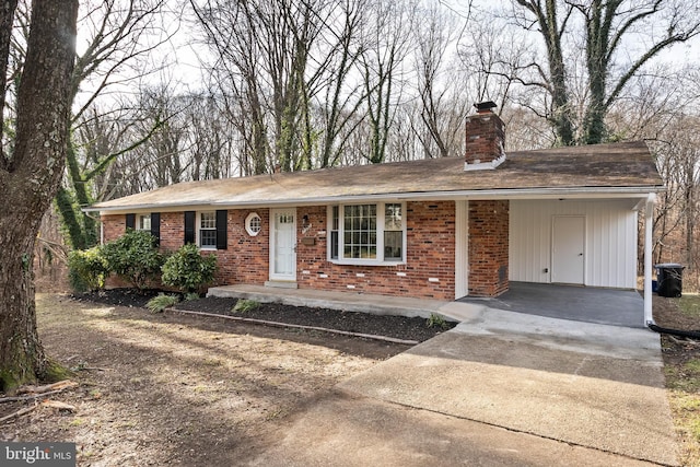 ranch-style home with a carport