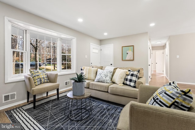 living room with dark hardwood / wood-style flooring