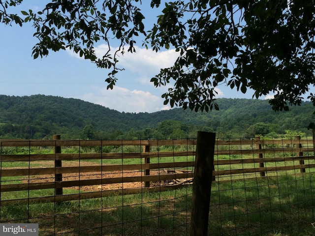 view of gate featuring a rural view