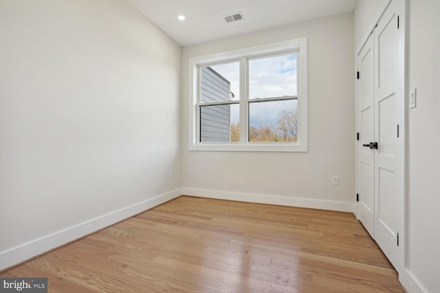 unfurnished bedroom featuring light hardwood / wood-style floors