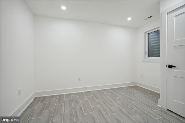 unfurnished room featuring light hardwood / wood-style floors