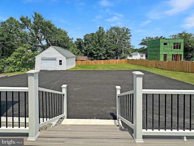 exterior space with an outbuilding and a lawn