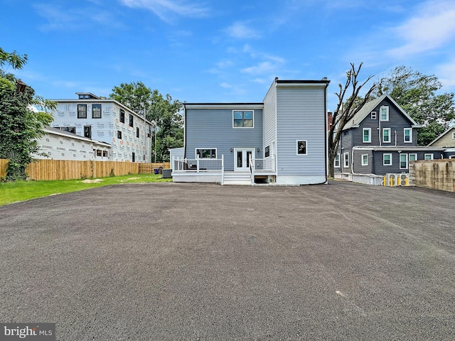 view of front of property featuring a wooden deck