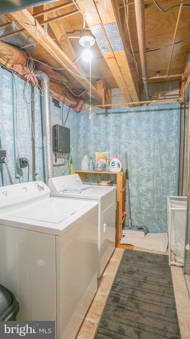 washroom featuring washer and dryer