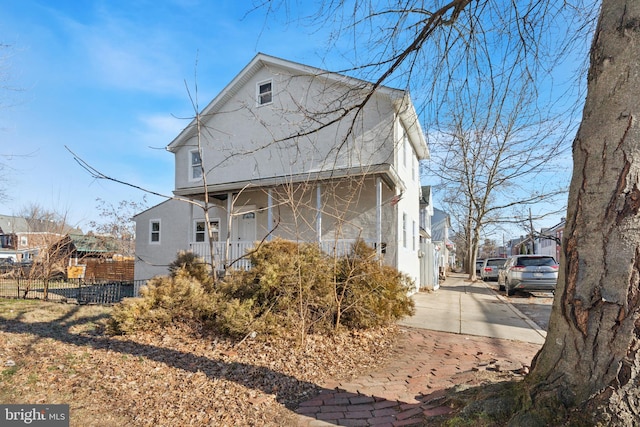 view of front of home featuring covered porch