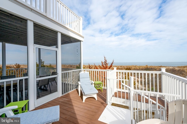 deck featuring a water view