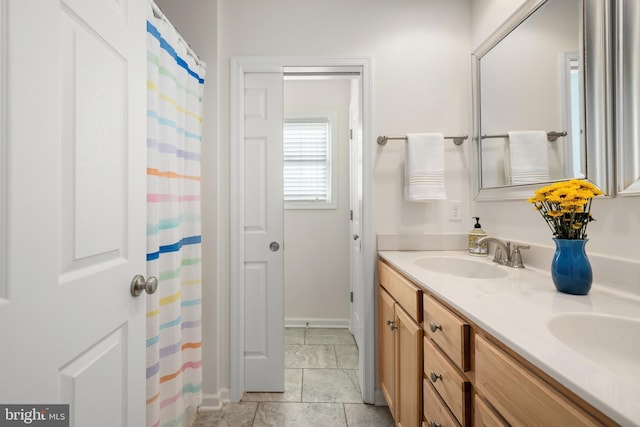 bathroom featuring vanity