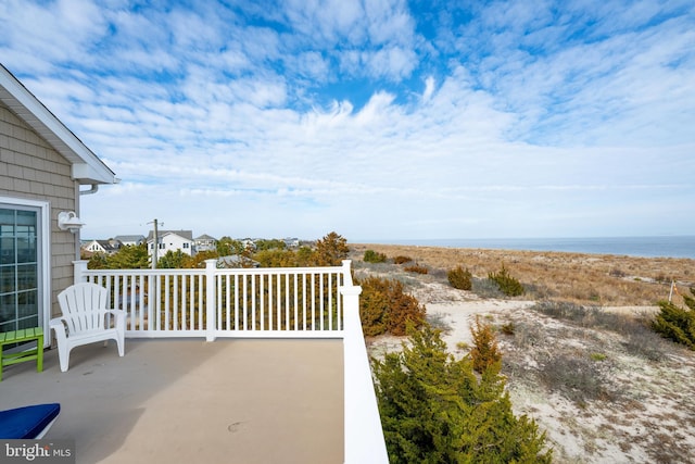 view of patio / terrace with a water view