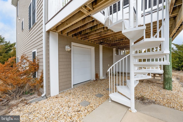 view of exterior entry featuring a garage