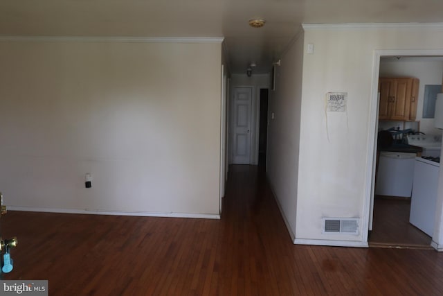 interior space featuring crown molding and dark wood-type flooring